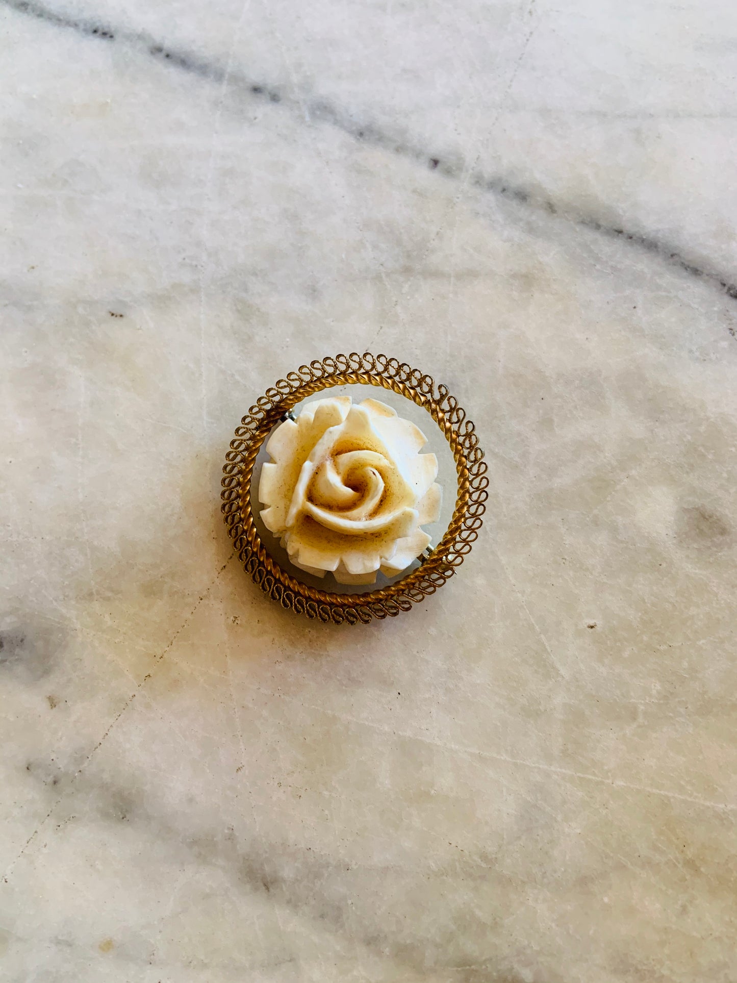 antique rose brooch